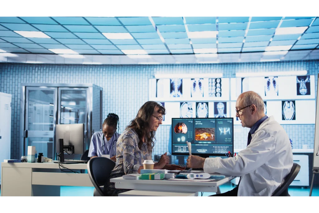 old-specialist-meeting-with-woman-patient-discuss-results-cabinet