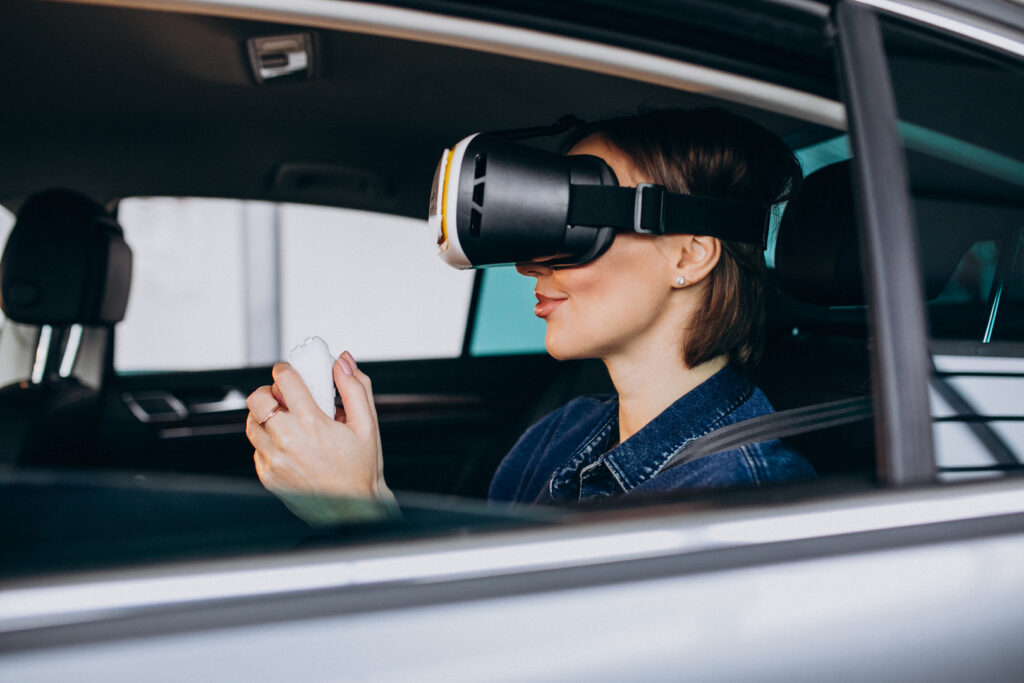woman-sitting-inside-car-wearing-vr-glasses